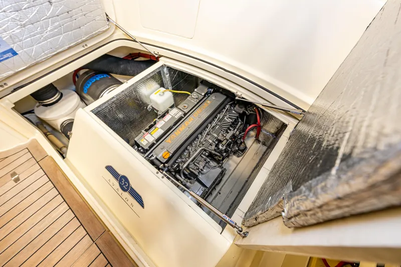 Rough Rider Yacht Photos Pics Engine compartment of 2006 Palm Beach Motor Yachts Avalon 32, showcasing detailed mechanics.