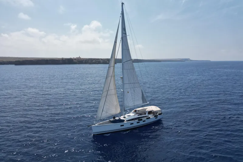  Yacht Photos Pics 2015 Jeanneau Yachts 64 sailing on open sea under clear skies.