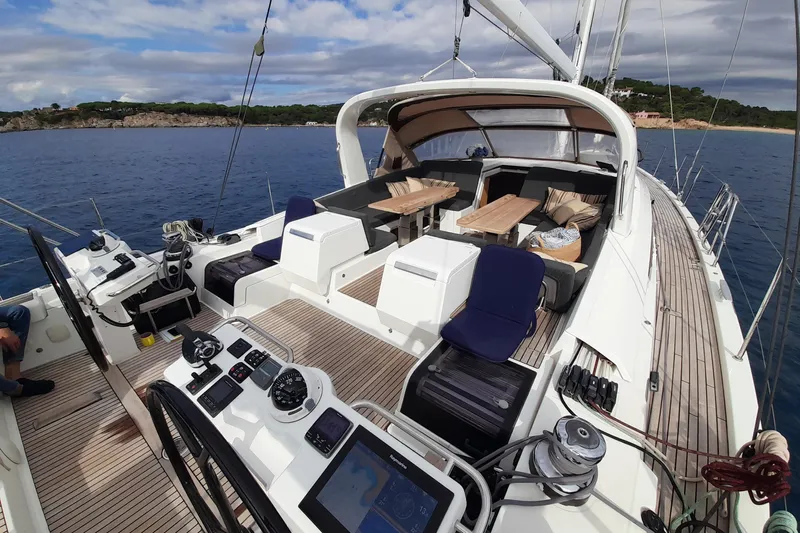  Yacht Photos Pics 2015 Jeanneau Yachts 64 sailing yacht with spacious deck and modern navigation equipment.