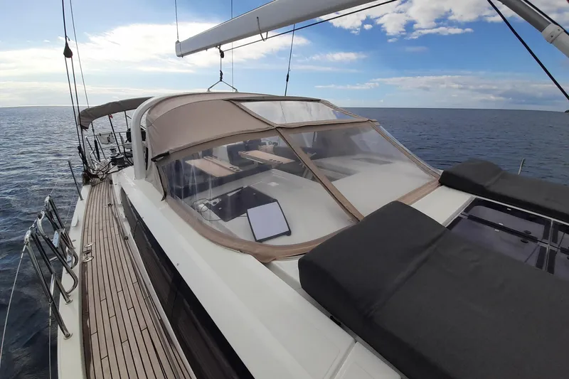  Yacht Photos Pics 2015 Jeanneau Yachts 64 sailing on open sea under clear skies.