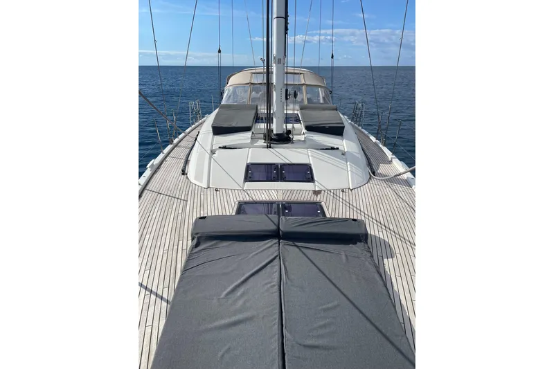  Yacht Photos Pics Jeanneau Yachts 64, 2015 model, luxurious deck view on open sea.