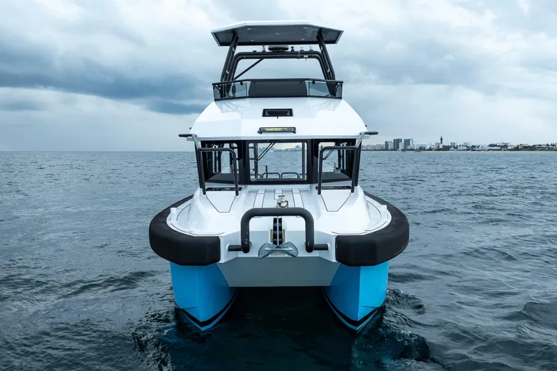  Yacht Photos Pics 2023 Vandal 46 Explorer boat on open sea under cloudy sky.