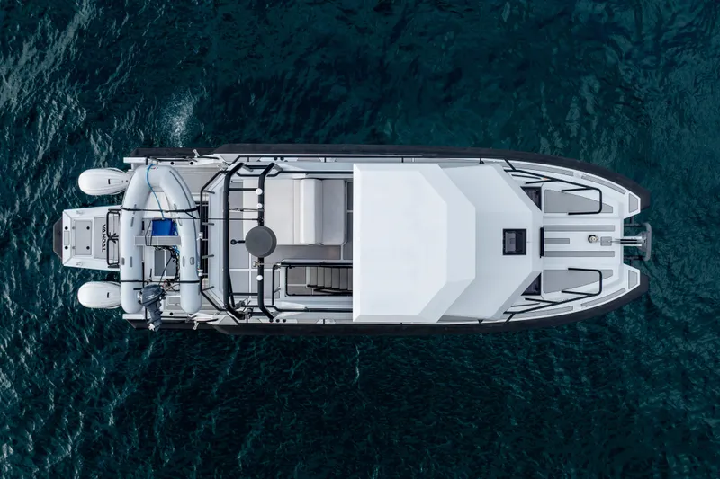  Yacht Photos Pics Top view of 2023 Vandal 46 Explorer yacht on deep blue water.