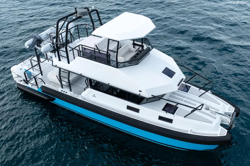  Yacht Photos Pics 2023 Vandal 46 Explorer yacht on open water, showcasing sleek design and modern features.