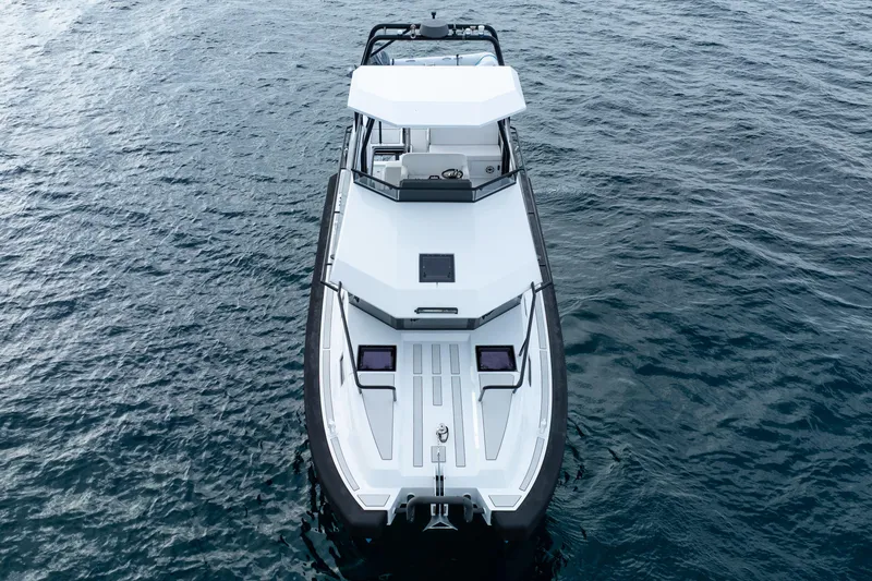  Yacht Photos Pics Aerial view of 2023 Vandal 46 Explorer boat on open water.