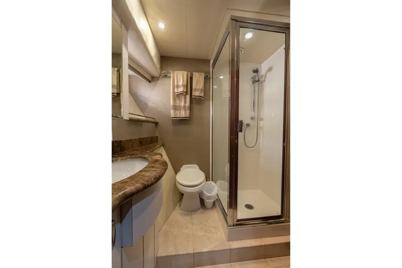 Last Call Yacht Photos Pics Luxurious bathroom in 2009 Pacific Mariner 65 Motoryacht with shower and elegant fixtures.