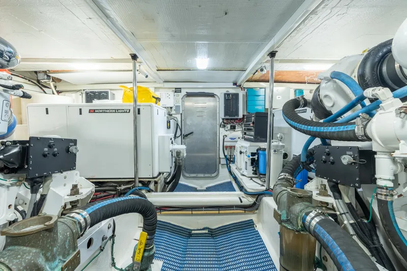 Last Call Yacht Photos Pics Engine room of 2009 Pacific Mariner 65 Motoryacht with Northern Lights generator.