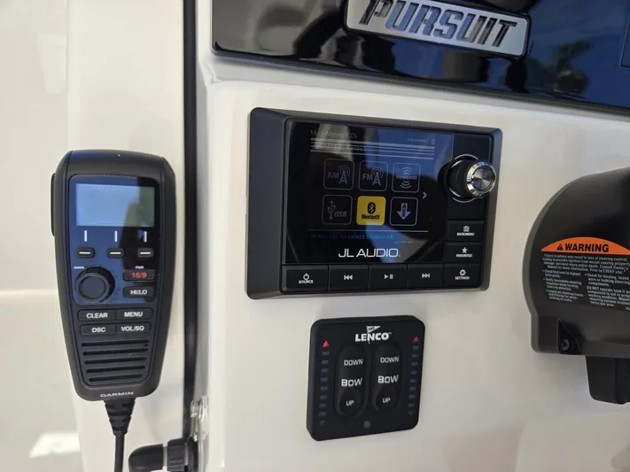  Yacht Photos Pics Control panel of a 2020 Pursuit 266 boat with radio and audio system.