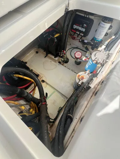  Yacht Photos Pics 2020 Pursuit 266 boat engine compartment with wiring and components.