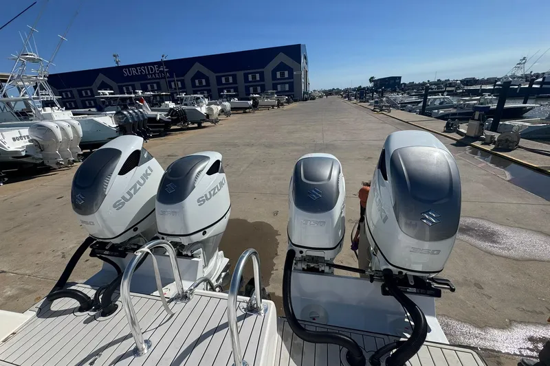 The Madd House Yacht Photos Pics 2023 Twin Vee 400 GFX CC with Suzuki outboard engines at Surfside Marina.