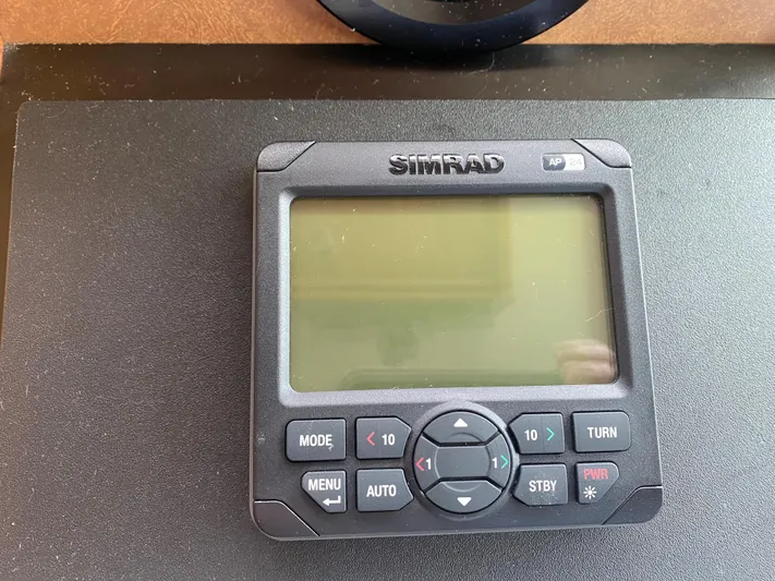  Yacht Photos Pics Simrad marine navigation device on Hatteras 53 Extended Deckhouse Motor Yacht, 1983 model.