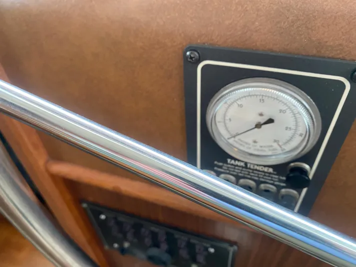  Yacht Photos Pics Gauge panel on 1983 Hatteras 53 Extended Deckhouse Motor Yacht, featuring a Tank Tender.