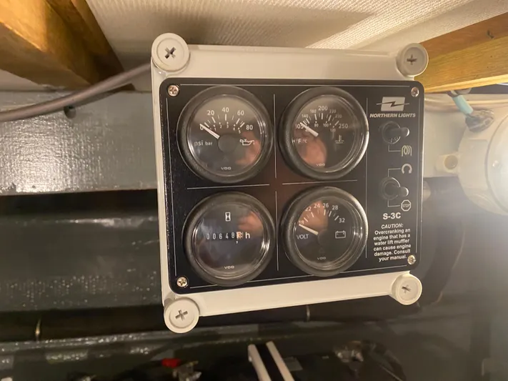  Yacht Photos Pics Control panel of a 1983 Hatteras 53 Extended Deckhouse Motor Yacht engine room.