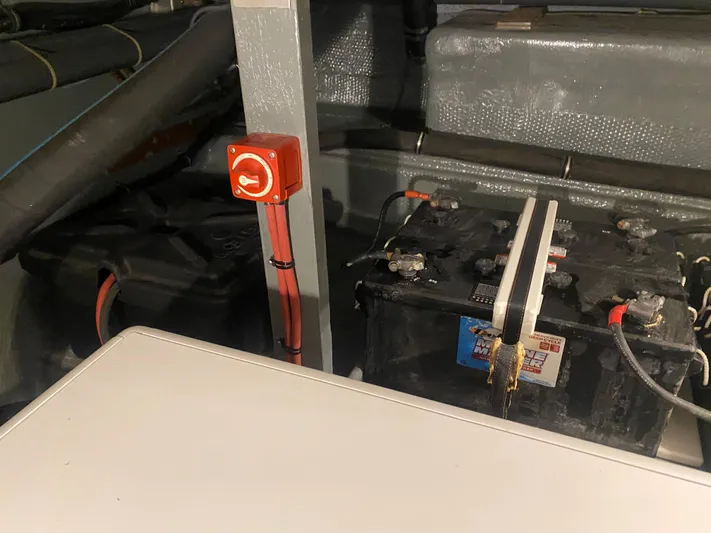  Yacht Photos Pics Battery compartment of 1983 Hatteras 53 Extended Deckhouse Motor Yacht with red switch.