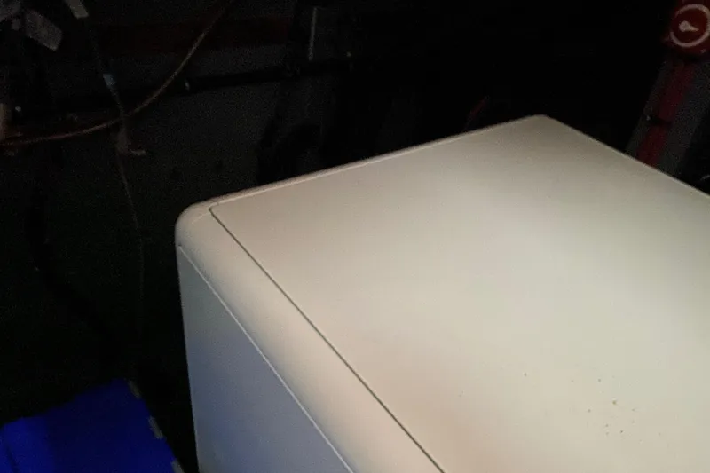  Yacht Photos Pics White appliance corner in dimly lit room, possibly on a 1983 Hatteras yacht.