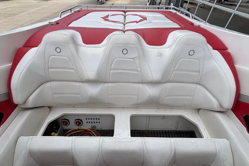  Yacht Photos Pics 2007 Fountain 38 Lightning boat interior with white and red seating.