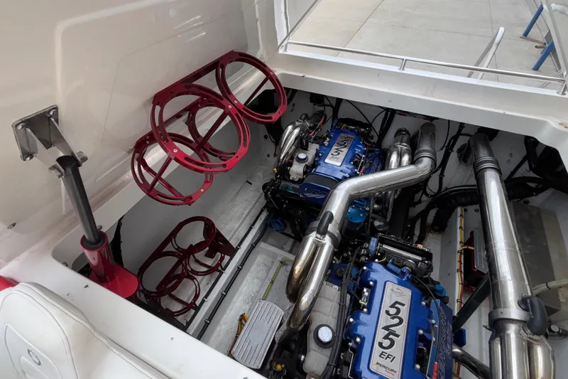  Yacht Photos Pics 2007 Fountain 38 Lightning engine compartment with dual Mercury 525 EFI engines and red accents.