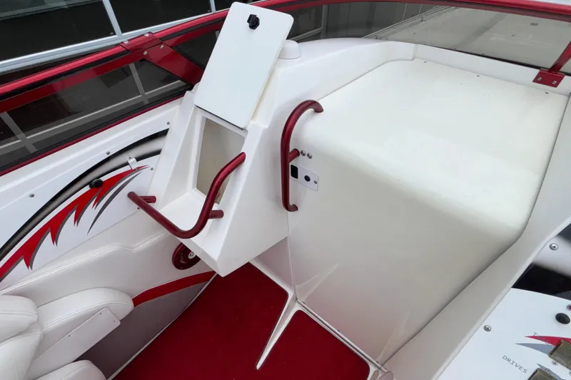  Yacht Photos Pics 2007 Fountain 38 Lightning boat interior with red accents and sleek design.