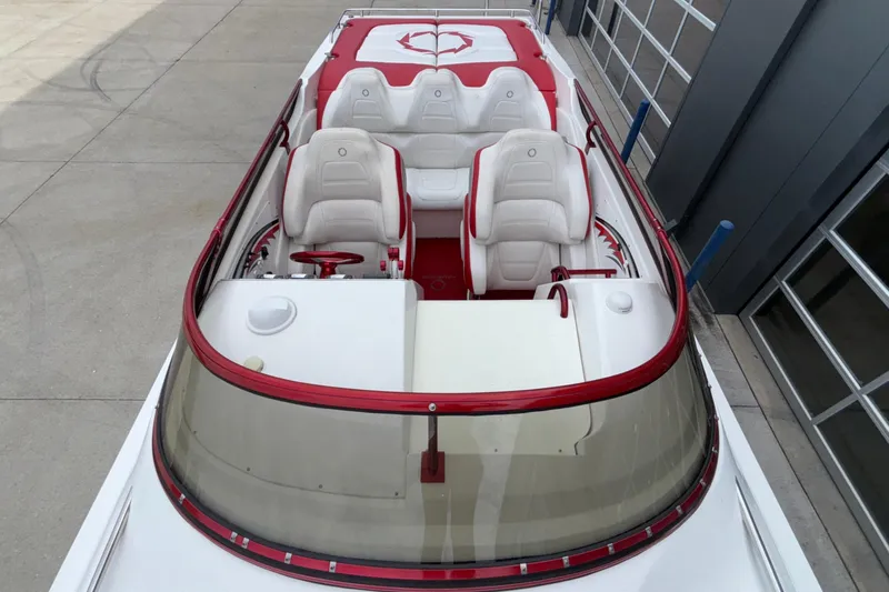  Yacht Photos Pics 2007 Fountain 38 Lightning boat interior with red and white seating, viewed from above.