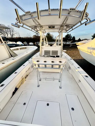  Yacht Photos Pics 2024 Contender 25 Tournament CC boat with center console and rod holders.