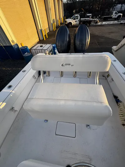  Yacht Photos Pics 2024 Contender 25 Tournament CC boat with dual engines and white seating.