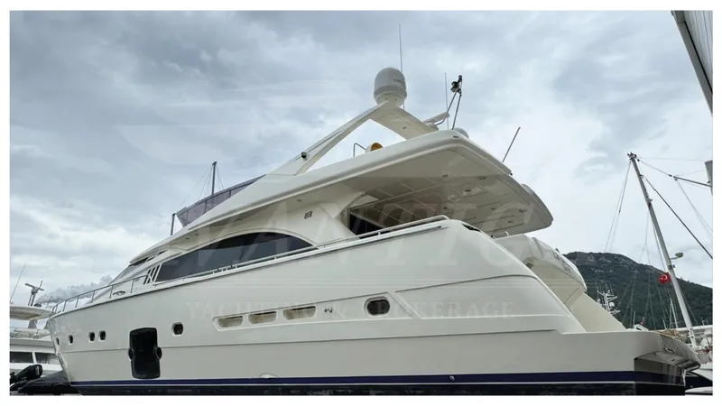  Yacht Photos Pics 2008 Ferretti Yachts 731, luxury yacht docked under cloudy skies.