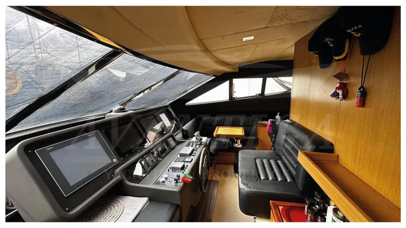  Yacht Photos Pics Interior of 2008 Ferretti Yachts 731, featuring modern navigation controls and luxurious seating.