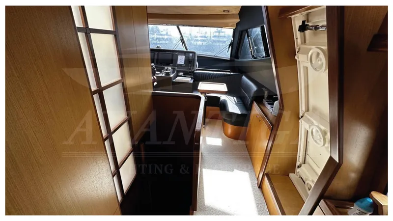  Yacht Photos Pics Interior of 2008 Ferretti Yachts 731, featuring elegant wood paneling and modern design.