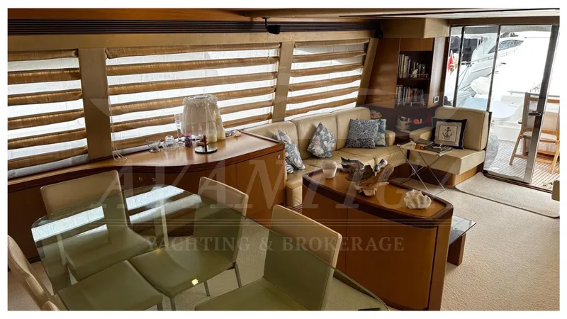  Yacht Photos Pics Luxurious interior of 2008 Ferretti Yachts 731 with elegant seating and dining area.