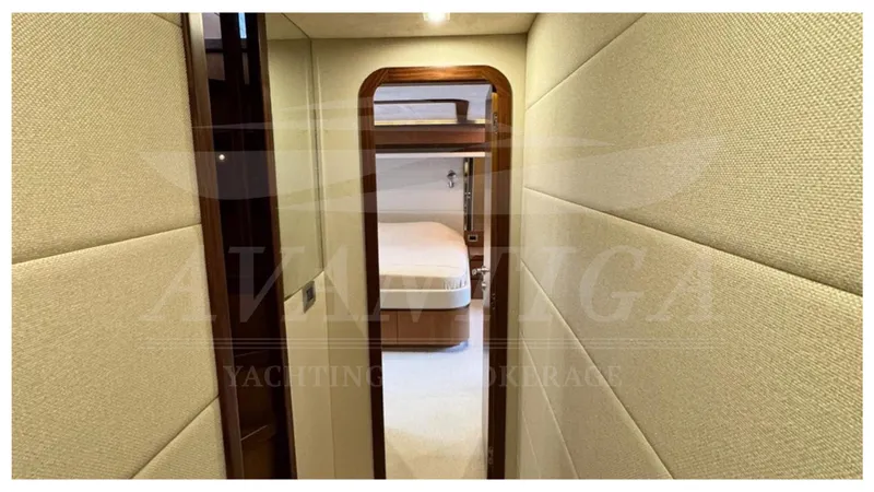  Yacht Photos Pics Luxurious interior hallway of 2008 Ferretti Yachts 731, featuring elegant wood and fabric finishes.