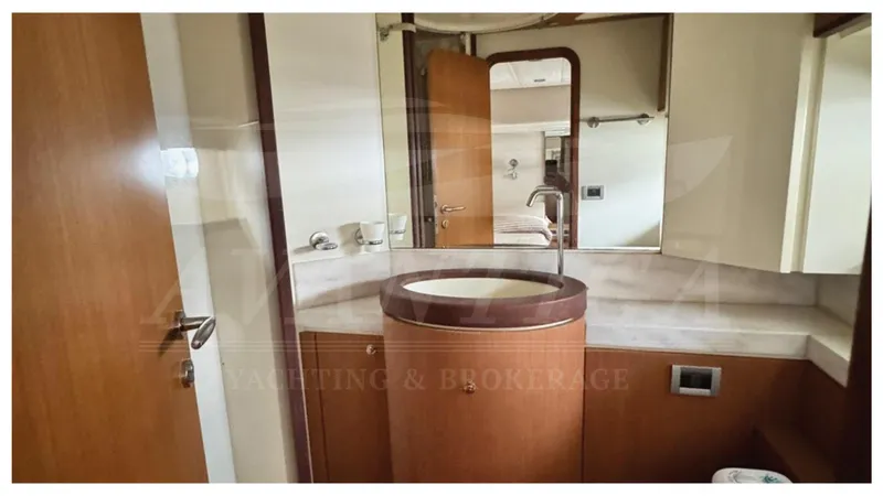  Yacht Photos Pics Luxurious bathroom in 2008 Ferretti Yachts 731, featuring modern fixtures and elegant design.
