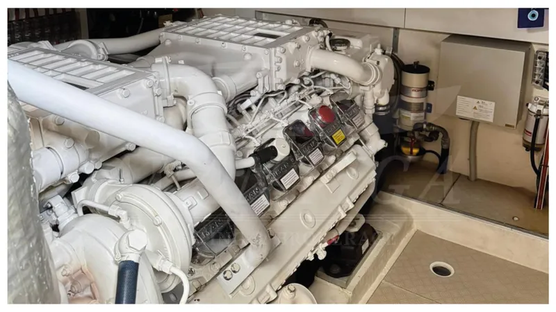  Yacht Photos Pics Engine room of 2008 Ferretti Yachts 731, showcasing powerful marine engine components.