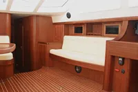 Luxurious interior of 2007 Motorsailer ВС-1800С with wooden finish and cream seating.
