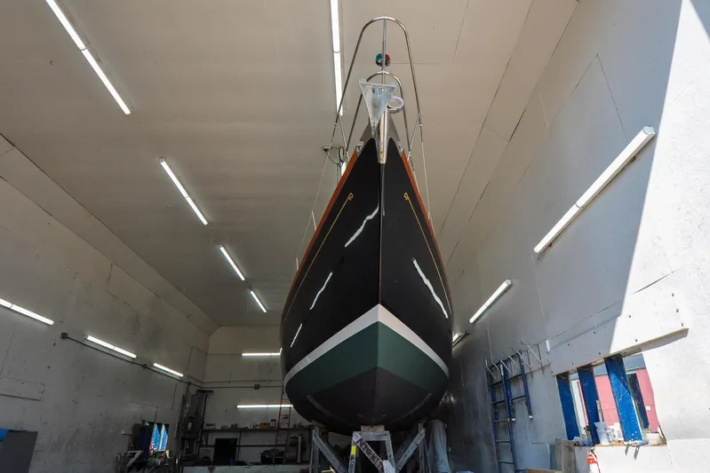 Night Train Yacht Photos Pics 1986 Hinckley Sou'wester 51 sailboat in a well-lit indoor facility.