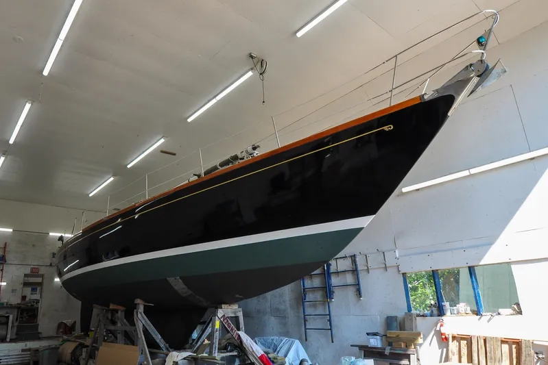 Night Train Yacht Photos Pics 1986 Hinckley Sou'wester 51 sailboat in a workshop, elevated for maintenance.