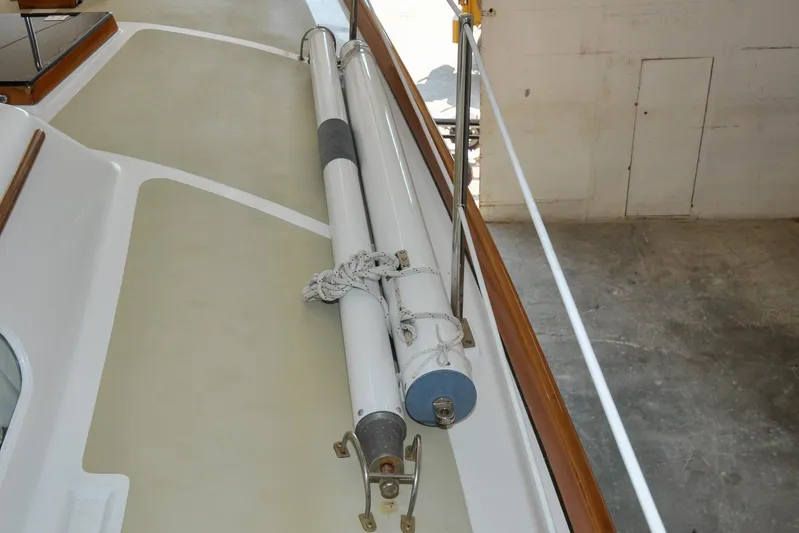 Night Train Yacht Photos Pics 1986 Hinckley Sou'wester 51 deck with stored sail poles.