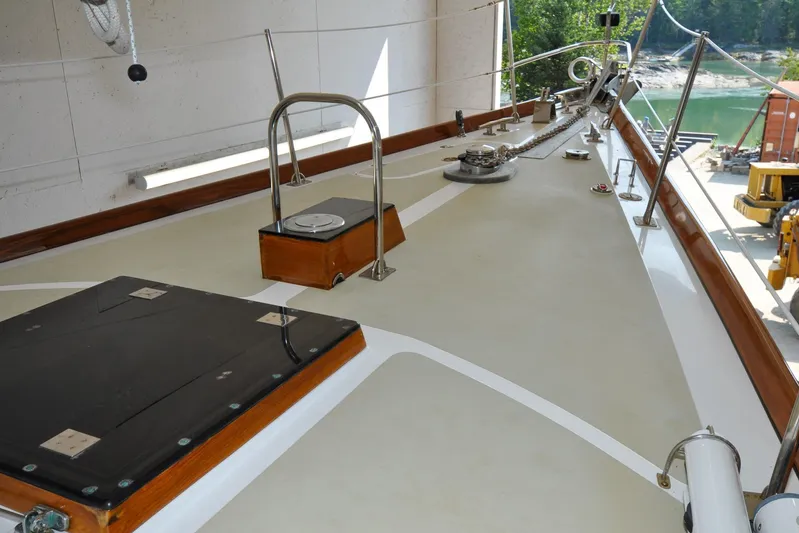 Night Train Yacht Photos Pics Deck of 1986 Hinckley Sou'wester 51 sailboat, featuring polished wood and metal fittings.