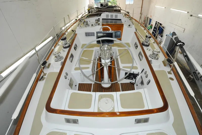 Night Train Yacht Photos Pics 1986 Hinckley Sou'wester 51 sailboat cockpit with steering wheel and control panels.