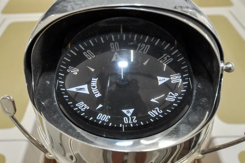 Night Train Yacht Photos Pics Ritchie compass on 1986 Hinckley Sou'wester 51 yacht, close-up view.