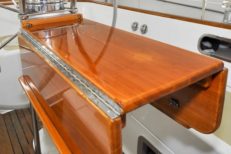 Night Train Yacht Photos Pics Polished wooden helm station on 1986 Hinckley Sou'wester 51 sailboat.