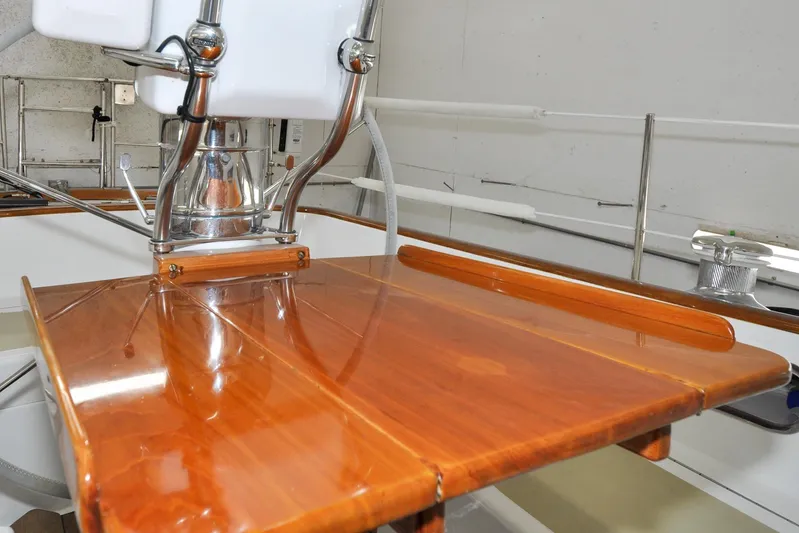 Night Train Yacht Photos Pics Polished wooden helm station on 1986 Hinckley Sou'wester 51 sailboat.