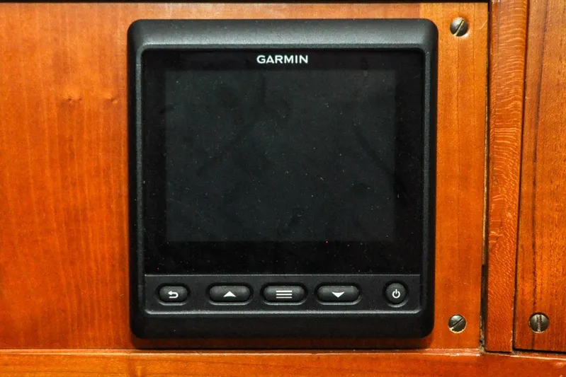 Night Train Yacht Photos Pics Garmin device on 1986 Hinckley Sou'wester 51 yacht's wooden panel.