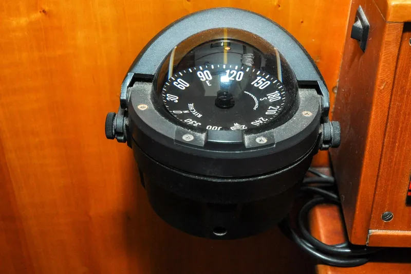 Night Train Yacht Photos Pics Compass on 1986 Hinckley Sou'wester 51 yacht, mounted on wooden panel.
