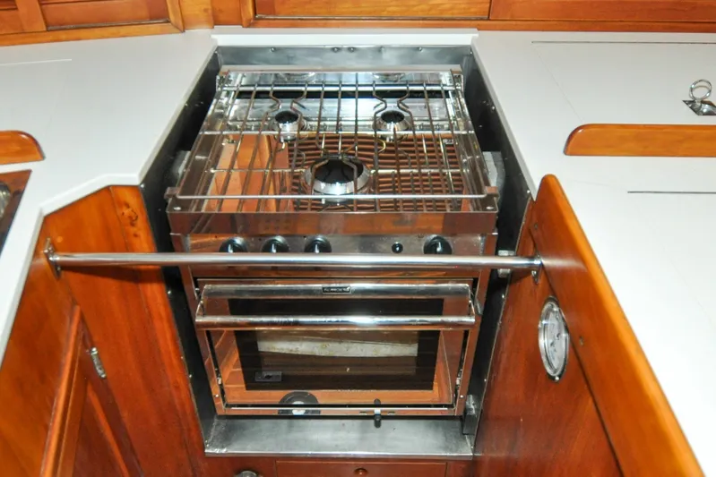 Night Train Yacht Photos Pics Galley stove and oven in 1986 Hinckley Sou'wester 51 yacht kitchen.