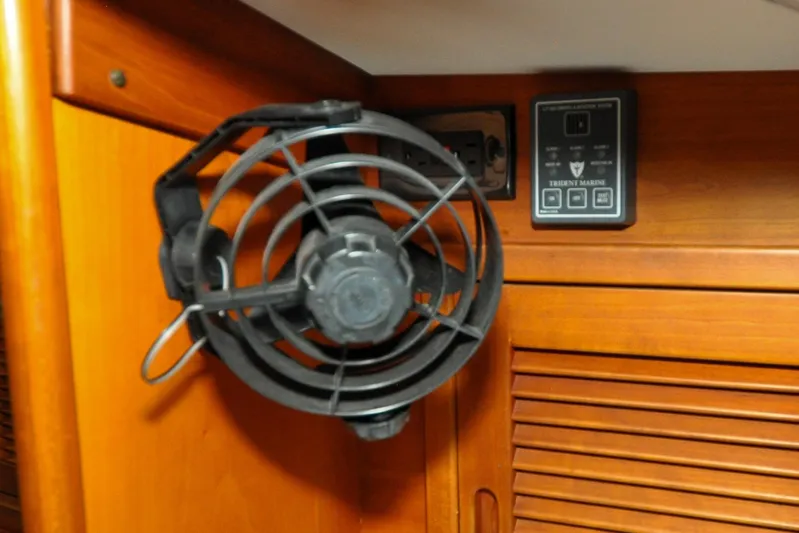 Night Train Yacht Photos Pics 1986 Hinckley Sou'wester 51 interior with fan and control panel.