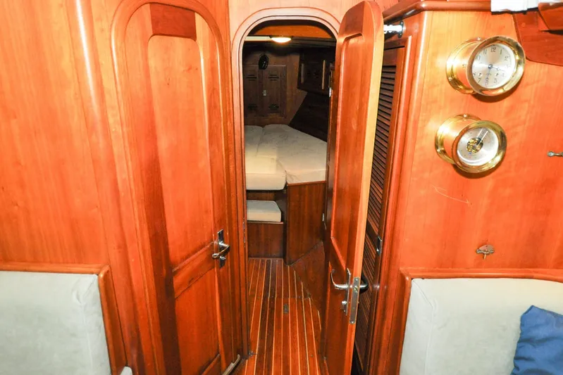 Night Train Yacht Photos Pics Interior of 1986 Hinckley Sou'wester 51 sailboat with wooden finish and cozy cabin.