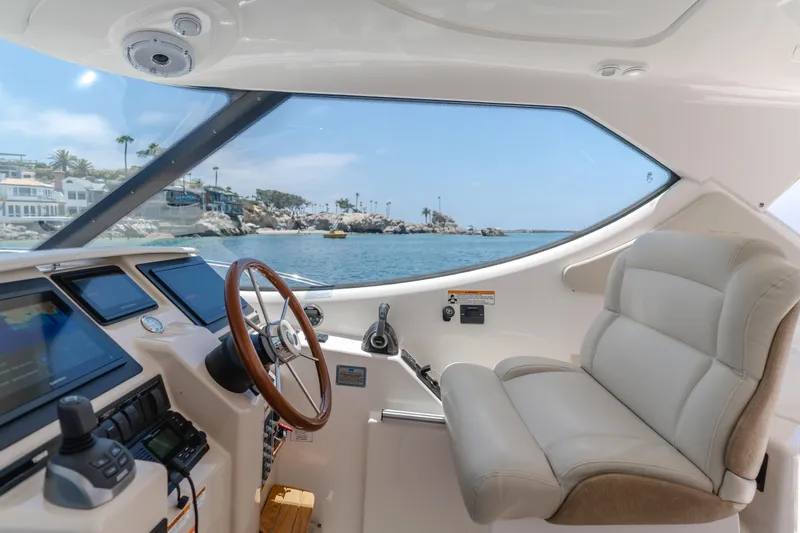 Worked The Plan Yacht Photos Pics 2009 Tiara Yachts 3900 Sovran helm with leather seat and ocean view.