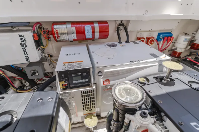 Worked The Plan Yacht Photos Pics Engine room of 2009 Tiara Yachts 3900 Sovran with Cummins Onan generator.