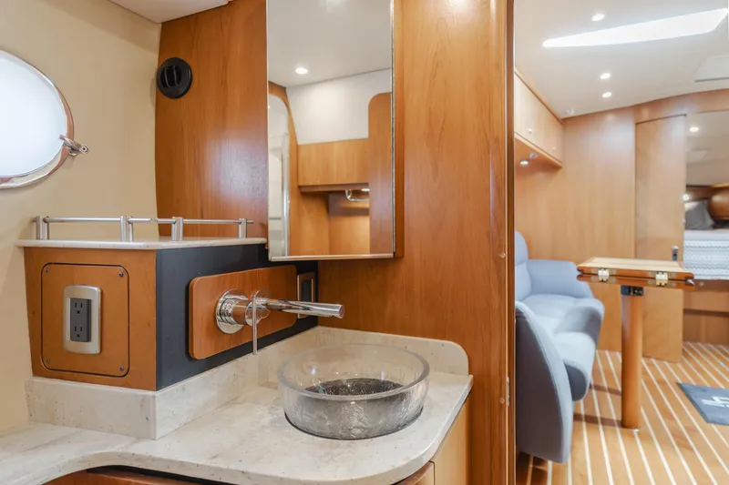 Worked The Plan Yacht Photos Pics 2009 Tiara Yachts 3900 Sovran interior with modern wood finish and elegant fixtures.