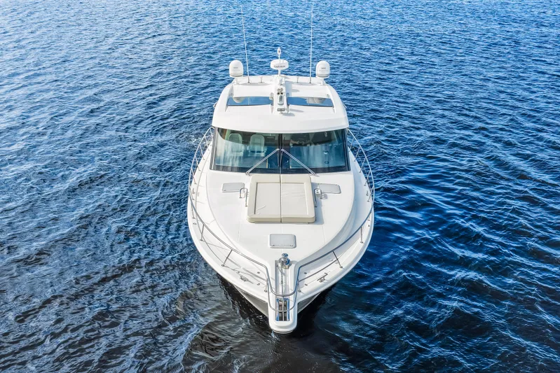 Escape Pod Yacht Photos Pics 2015 Riviera 565 SUV yacht on open water, aerial view.